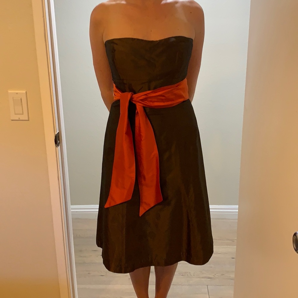 Brown dress with orange sash